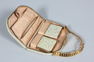 Lot 153 - A Stratton vanity purse, 1950s, with matching...