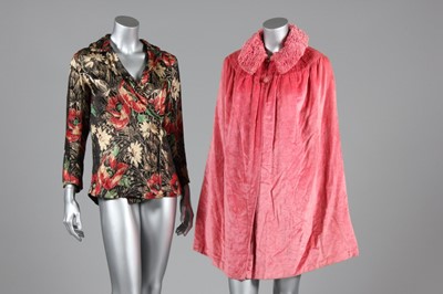 Lot 5 - A rose pink velvet evening cape, late 1920s,...