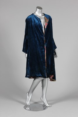 Lot 5 - A rose pink velvet evening cape, late 1920s,...