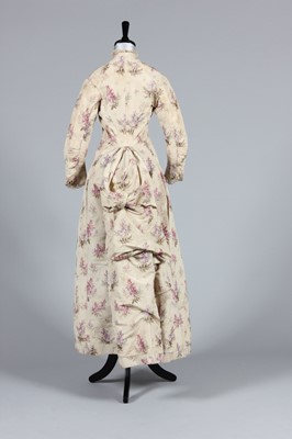 Lot 12 - A Chine taffeta dress, early 1870s, formed...
