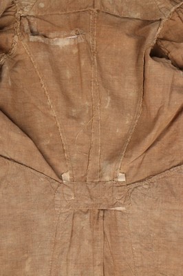 Lot 94 - A rare young man's nankeen tailcoat, 1815-20,...