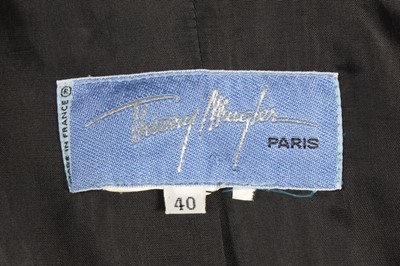 Lot 20 - A Thierry Mugler black crepe suit, 1980s,...