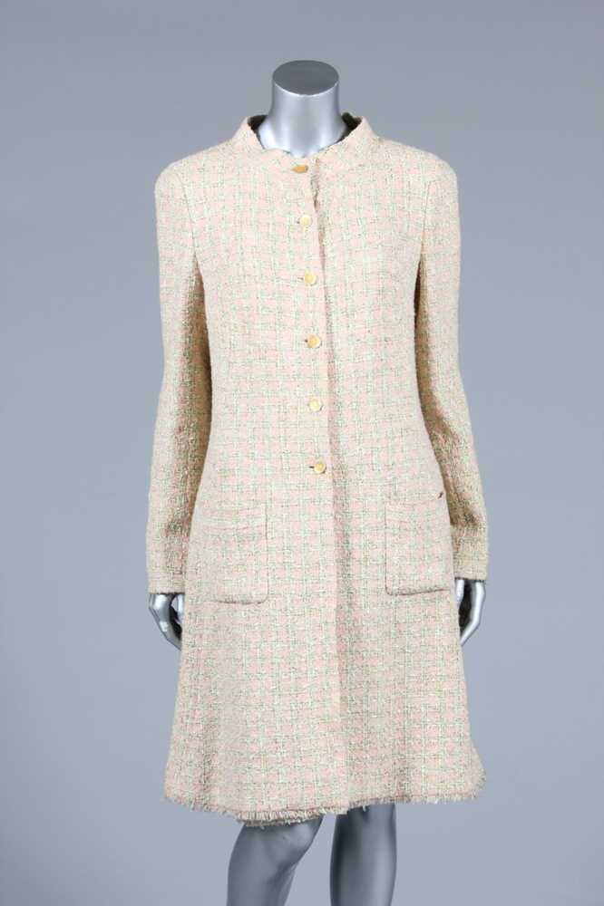 Lot 23 - A Chanel wool coat and matching skirt, circa...