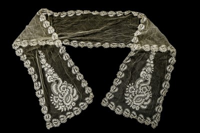 Lot 349 - An ecru tamboured net veil, circa 1900, with...