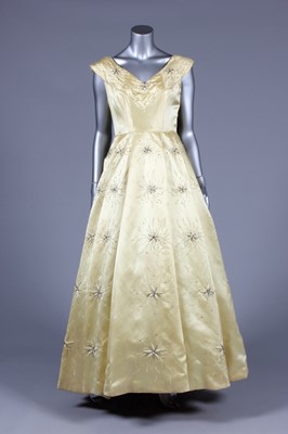 Lot 43 - A Paquin primrose yellow satin ball gown, 1954-...