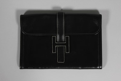Lot 47 - An Hermès black box calf leather clutch bag,...