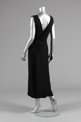 Lot 115 - A Balenciaga couture black silk cloqué...