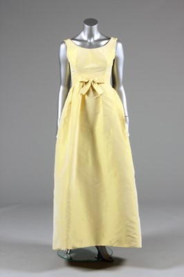 Lot 105 - A Cristobal Balenciaga primrose yellow silk...