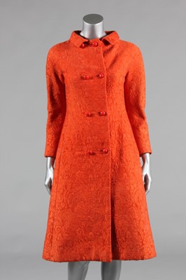 Lot 125 - An Hubert de Givenchy couture orange...