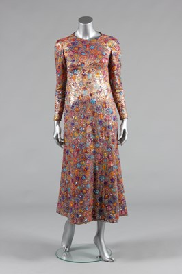 Lot 117 - A Givenchy couture floral lam evening gown and...
