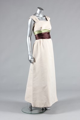 Lot 122 - A John Cavanagh couture ivory silk faille gown...