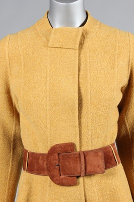 Lot 136 - A Madame Grès mustard wool coat, probably...