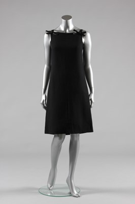 Lot 137 - An Andre Courrges black wool cocktail dress,...