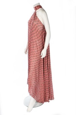 Lot 199 - A Madame Grès printed chiffon evening gown,...