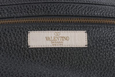 Lot 75 - A Valentino Rockstud beaded black leather tote,...