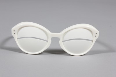 Lot 26 - A pair of Courrges white plastic sunglasses,...
