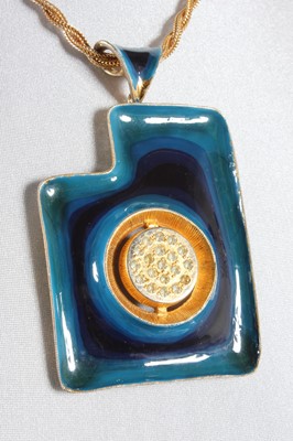 Lot 27 - A Pierre Cardin enamelled metal pendant, late...