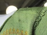 Lot 29 - A rare green and yellow knitted silk woman's...