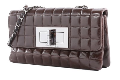 Lot 23 - A Chanel quilted chocolate brown leather bag,...