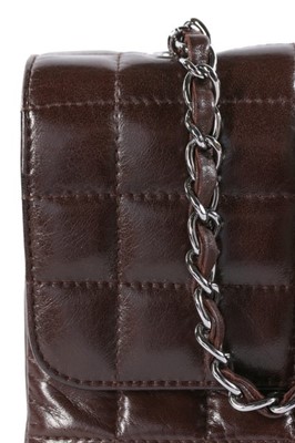 Lot 23 - A Chanel quilted chocolate brown leather bag,...