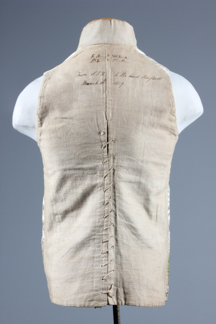 Lot 31 - An embroidered ivory satin waistcoat worked