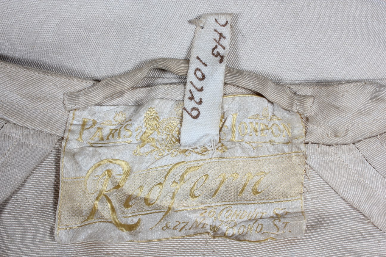 Lot 40 - A rare Redfern ivory silk driving/duster coat,