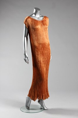 Lot 48 - A Mariano Fortuny copper silk Delphos gown,...