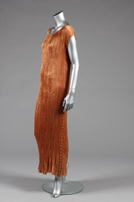 Lot 48 - A Mariano Fortuny copper silk Delphos gown,...