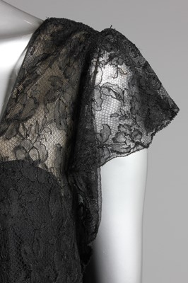 Lot 57 - A Chanel couture black lace evening gown, mid...