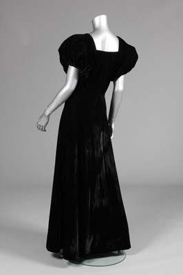 Lot 58 - A Madeleine Vionnet black velvet bias-cut gown,...