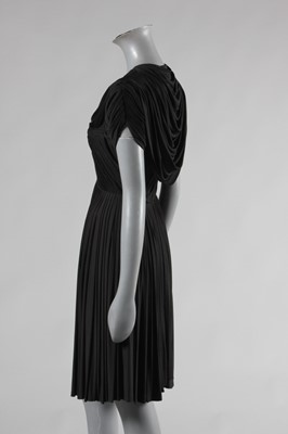 Lot 71 - A Madame Grès couture black draped jersey...