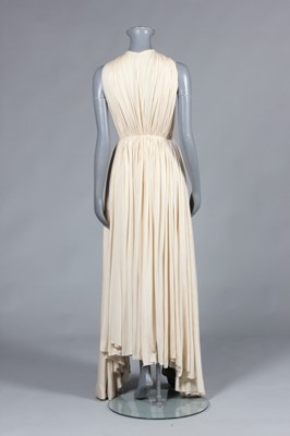 Lot 70 - A Madame Grès ivory silk evening gown, late...