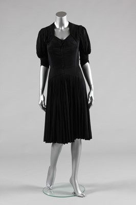 Lot 69 - A Madame Grès black jersey dinner gown, circa...