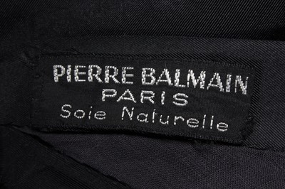 Lot 84 - A Pierre Balmain black faille ball gown, circa...