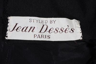 Lot 98 - A Jean Dessès designed black wool dress, early...