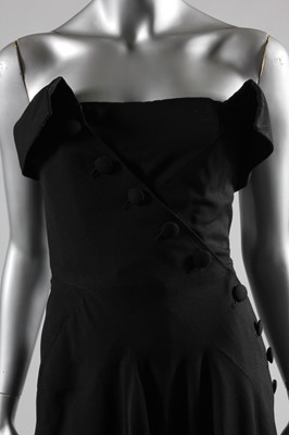 Lot 98 - A Jean Dessès designed black wool dress, early...
