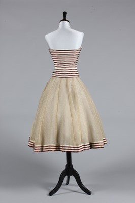 Lot 87 - A Chanel couture striped satin cocktail dress,...