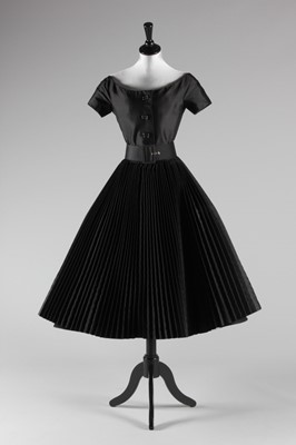 Lot 91 - A black shantung silk gown in the style of...