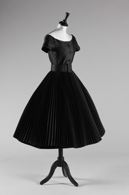 Lot 91 - A black shantung silk gown in the style of...