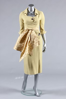 Lot 100 - A Robert Piguet mustard yellow wool day dress,...