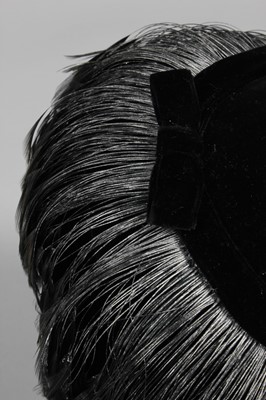 Lot 81 - A Balenciaga black velvet and grey feather...