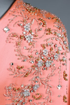 Lot 116 - A Valentino couture salmon-pink crêpe evening...