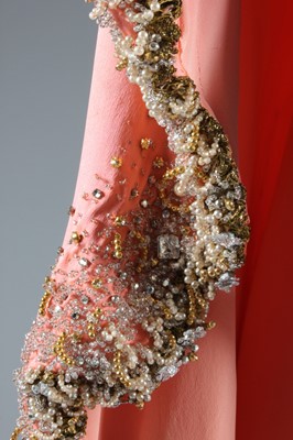 Lot 116 - A Valentino couture salmon-pink crêpe evening...