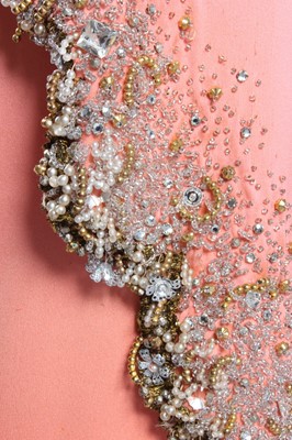 Lot 116 - A Valentino couture salmon-pink crêpe evening...