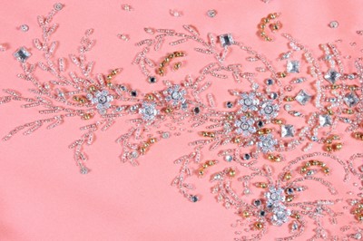 Lot 116 - A Valentino couture salmon-pink crêpe evening...