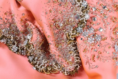 Lot 116 - A Valentino couture salmon-pink crêpe evening...