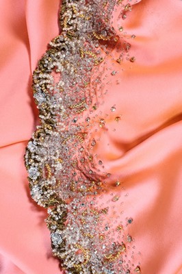Lot 116 - A Valentino couture salmon-pink crêpe evening...