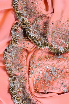 Lot 116 - A Valentino couture salmon-pink crêpe evening...