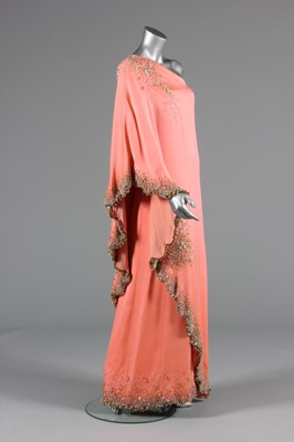 Lot 116 - A Valentino couture salmon-pink crêpe evening...