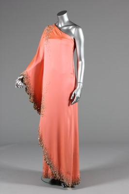 Lot 116 - A Valentino couture salmon-pink crêpe evening...